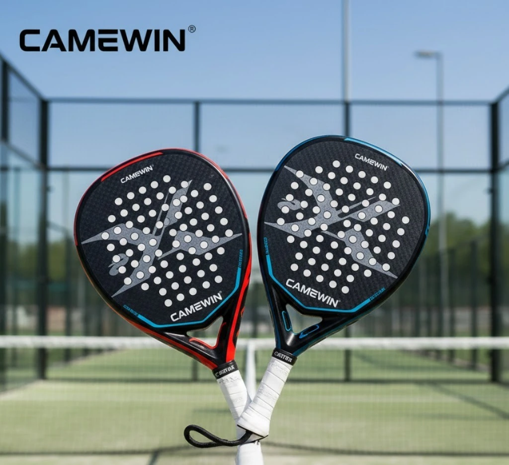 Two Camewin padel rackets crossed in front of a padel court.